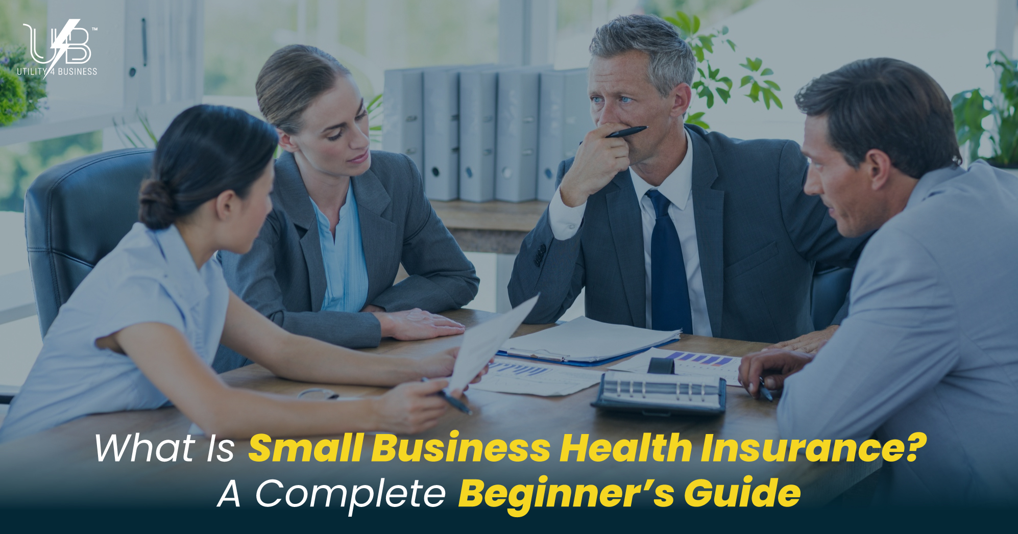 Small business health insurance guide by Utility4Business. Four professionals discussing coverage options at a meeting table.